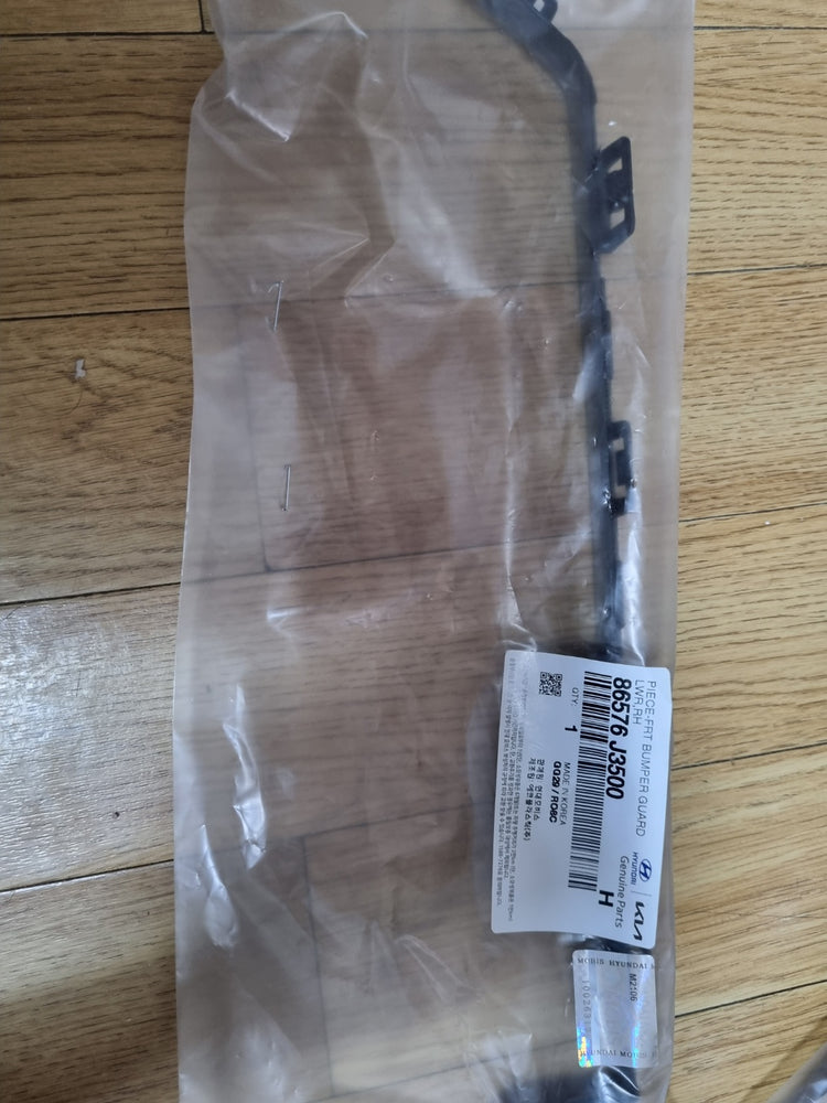 86576J3500-PIECE-FRT BUMPER GUARD LWR RH