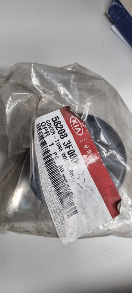 582083F000-COVER-TONE WHEEL RH