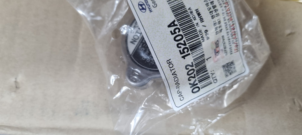 0K20215205A-CAP ASSY-RADIATOR