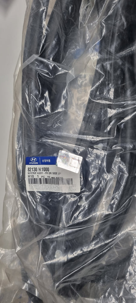 82130H1000-W/STRIP ASSY-FR DR SIDE LH