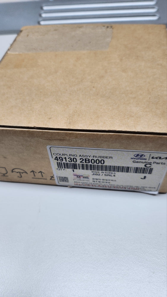 491302B000-COUPLING ASSY-RUBBER