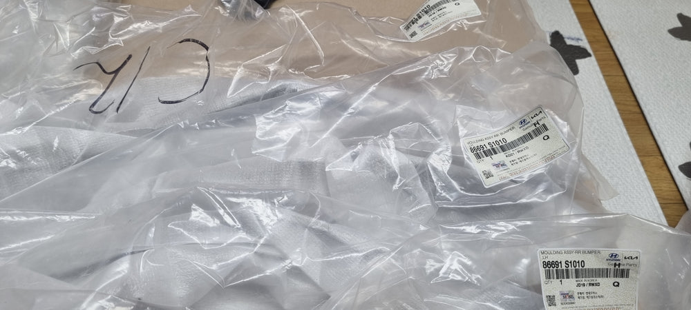 86691S1010-MOULDING ASSY-RR BUMPER LH